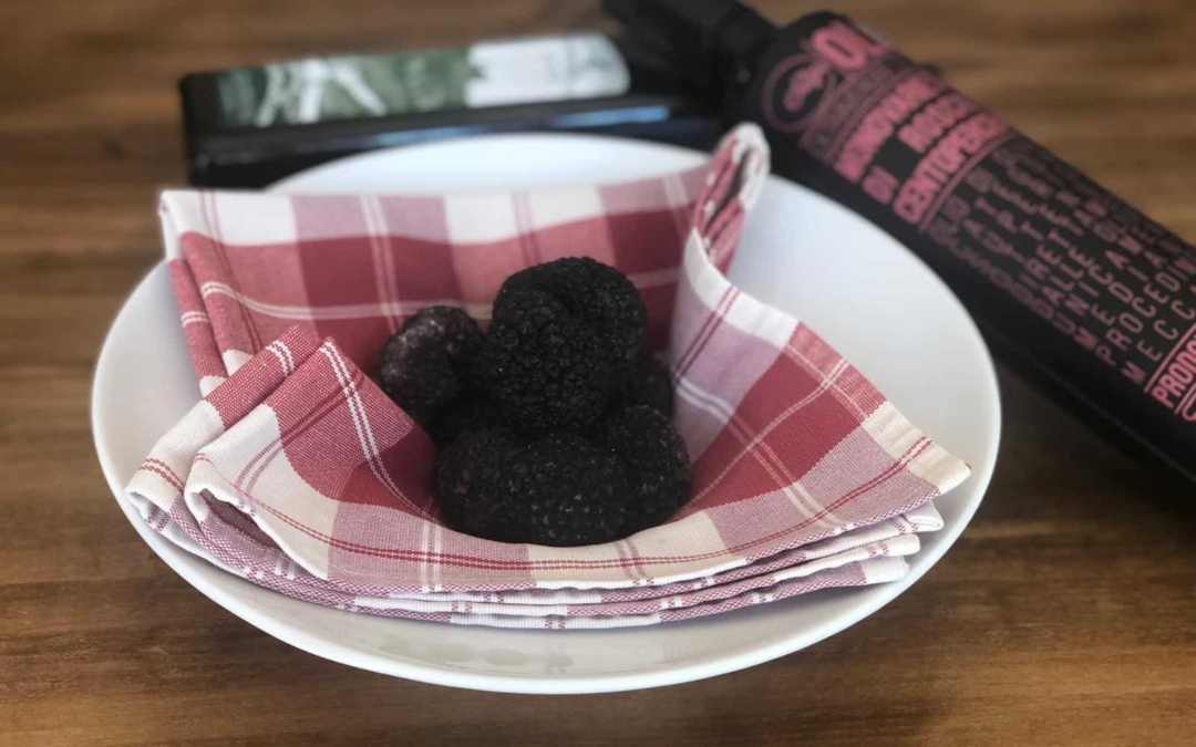 Olio extravergine di oliva e tartufo fresco